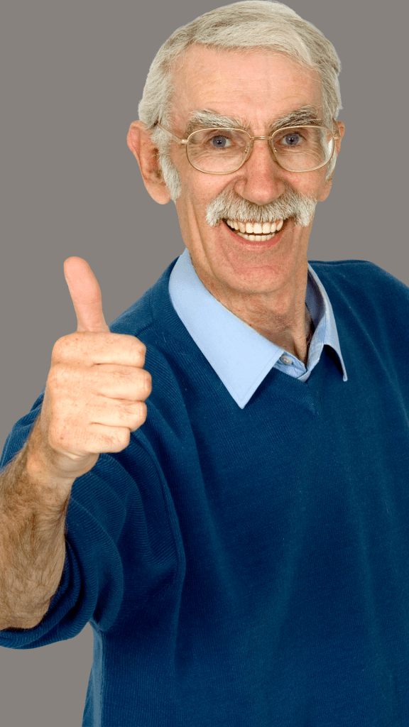 a middle aged man with great hair and glasses smiling and giving a thumbs up to the camera
